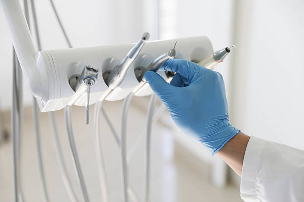Professional Dental Implants technician working in Clifton Gardens, NY